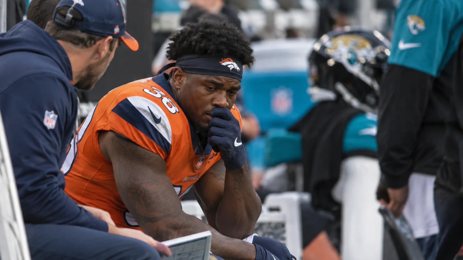 Denver Broncos running back on the sideline before the Jaguars game